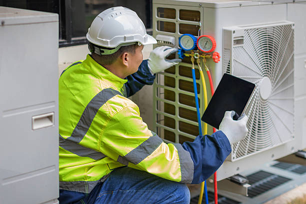 Professional Heat Pump Repair technician working in Renton, WA